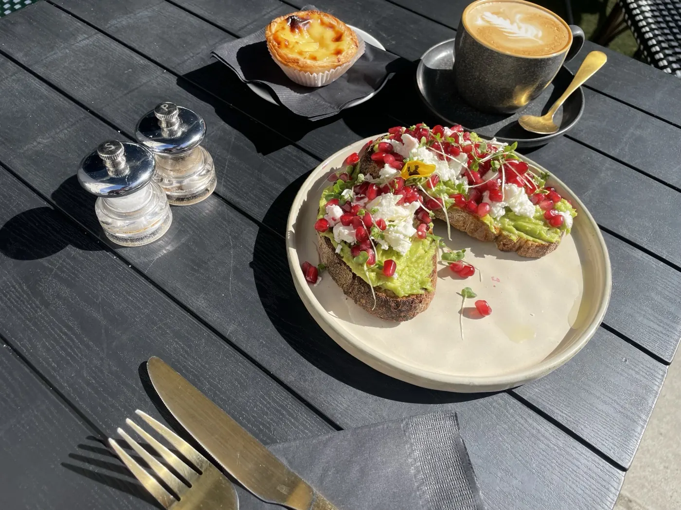 Avocado toast, plated on the terrace table